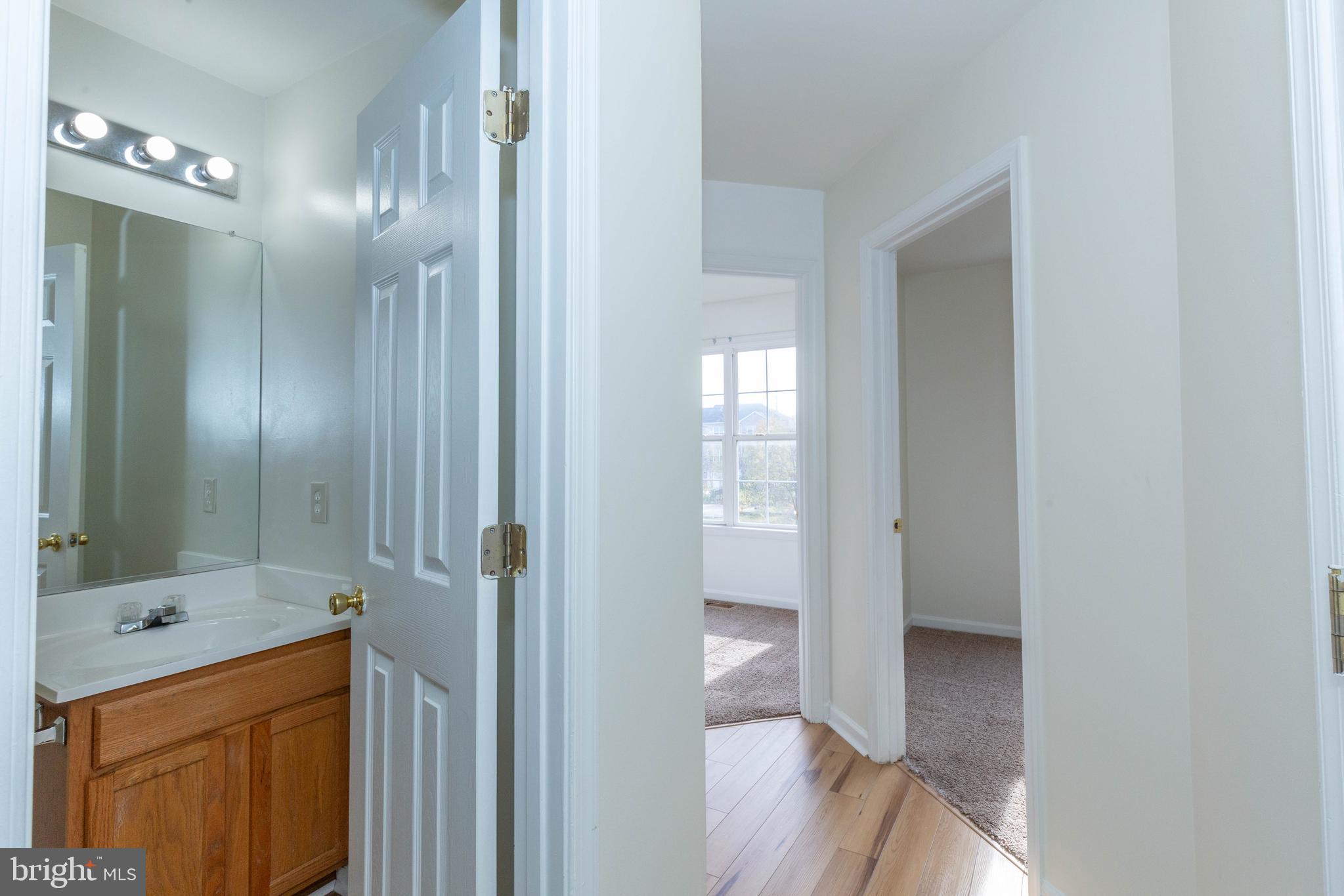 124 Pony Circle Martinsburg, WV 25405 - Photo 20 of 28 a bathroom with a sink and a mirror