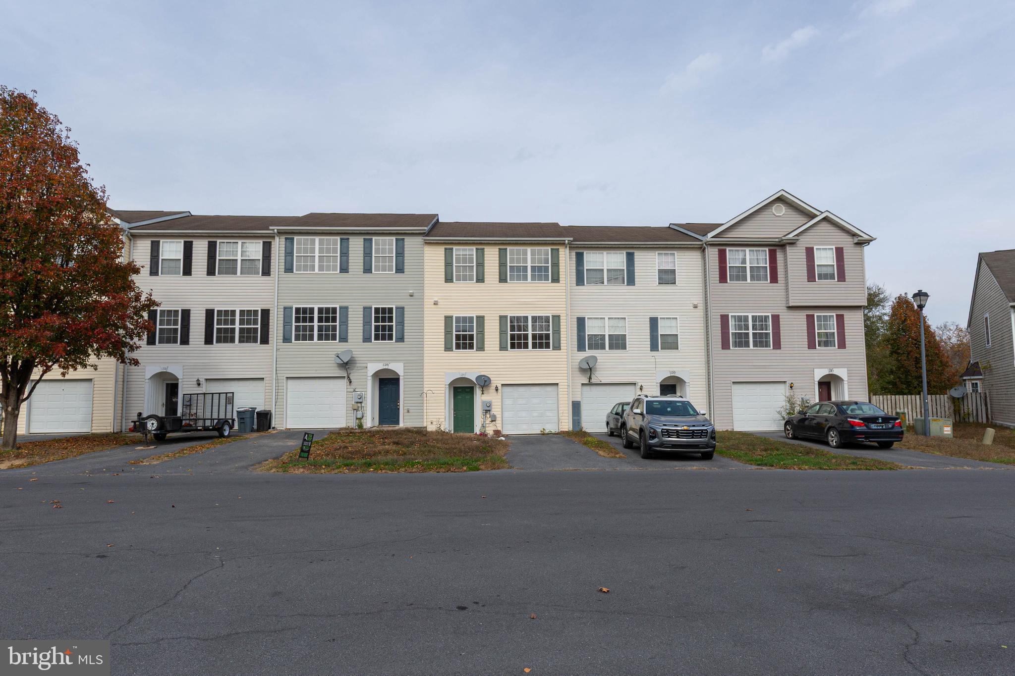 124 Pony Circle Martinsburg, WV 25405 - Photo 2 of 28 a view of multiple houses with a street