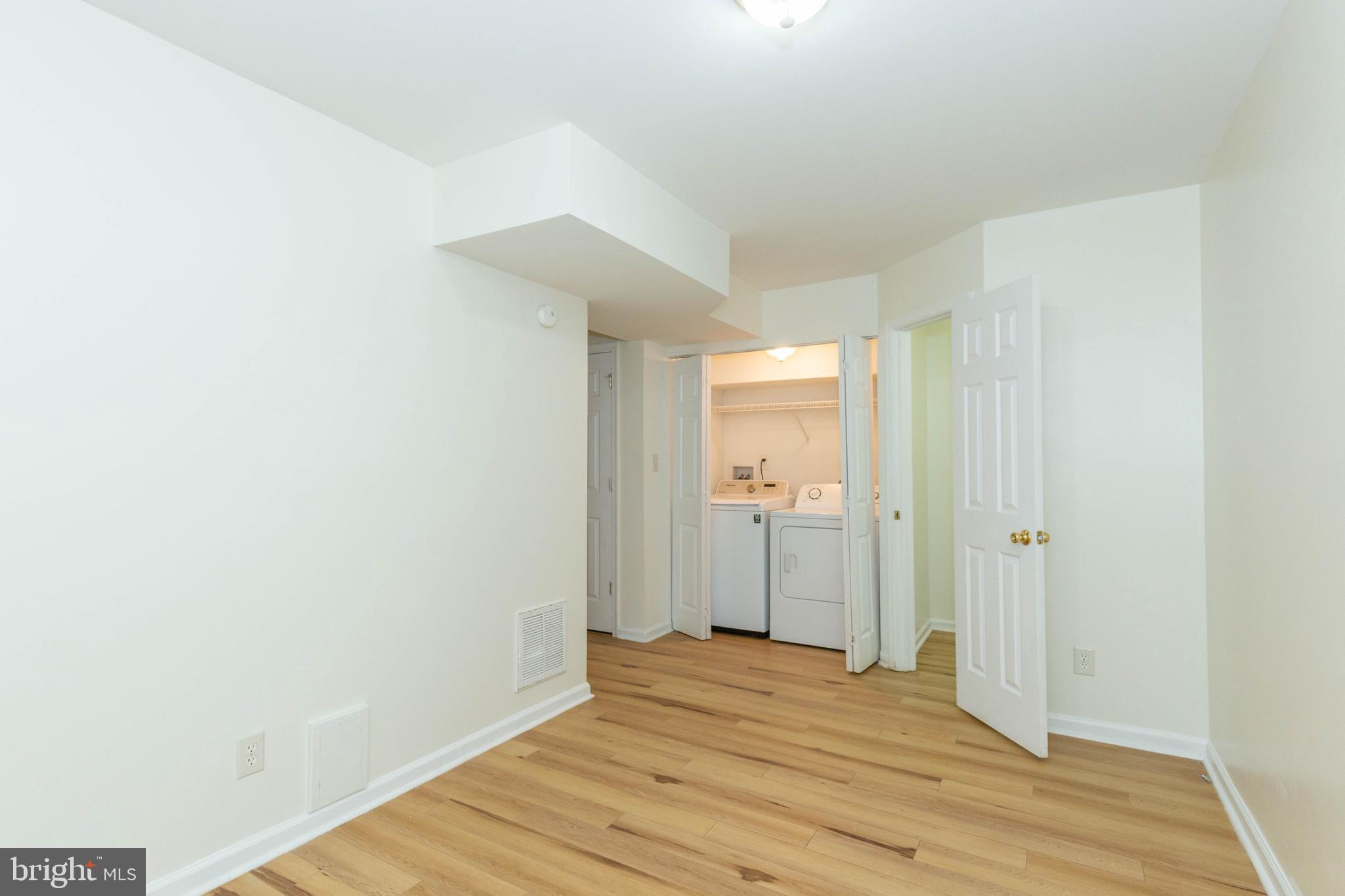 124 Pony Circle Martinsburg, WV 25405 - Photo 26 of 28 a view of a room with wooden floor and a bathroom