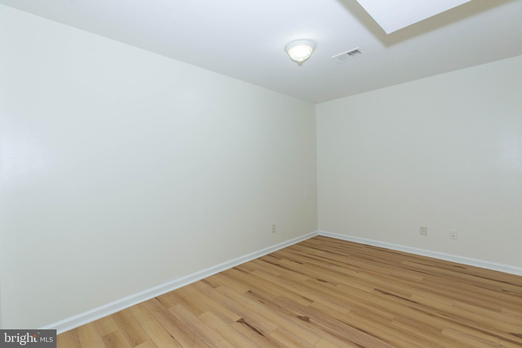 124 Pony Circle Martinsburg, WV 25405 - Photo 5 of 28 a view of an empty room with wooden floor