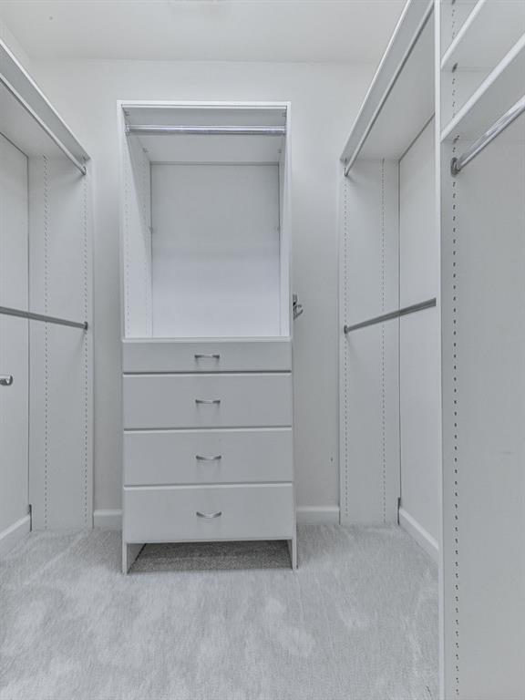 626 Laurel Crossing Canton, GA 30114 - Photo 37 of 77 a view of an empty walk in closet