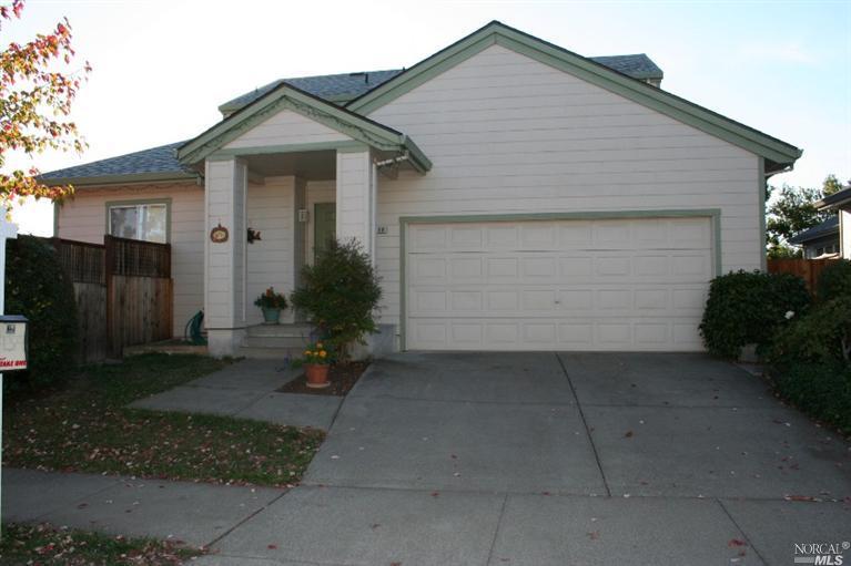 2149 Frida Street Santa Rosa, CA 95403 - Photo 1 of 1 a front view of a house with garden