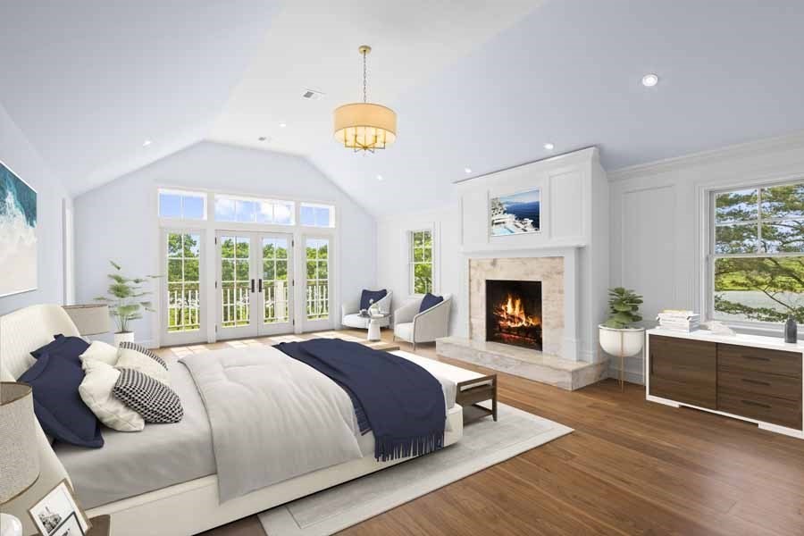 160 Peppercorn Lane Barnstable, MA 02635 - Photo 5 of 11 a spacious bedroom with a bed and a fireplace