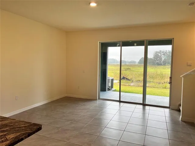 a bathroom with a sink toilet double vanity and shower
