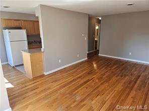 14 Pavilion Road, Unit 8 Suffern, NY 10901 - Photo 4 of 7 a view of an empty room with a window