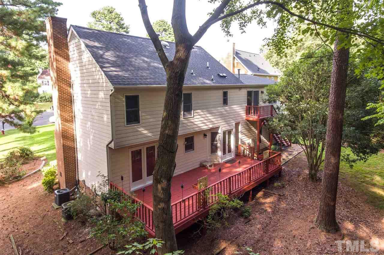 5913 Stable Court Raleigh, NC 27612 - Photo 24 of 25 a front view of house with a garden
