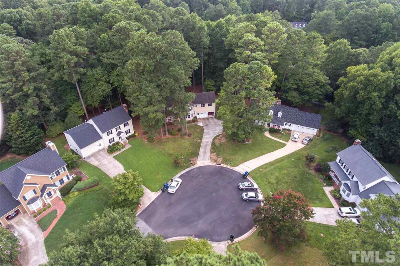 5913 Stable Court Raleigh, NC 27612 - Photo 25 of 25 an aerial view of a house with garden space ocean and mountain view in back