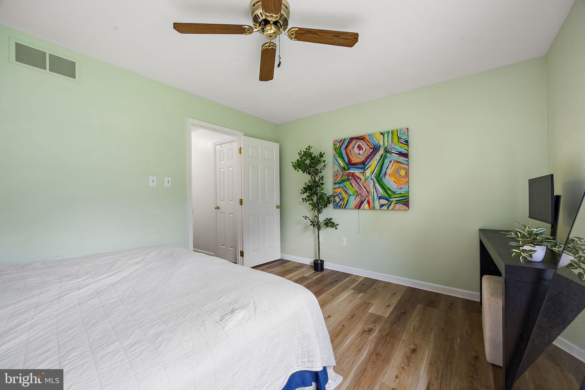 40 Arizona State Drive Newark, DE 19713 - Photo 28 of 50 Bright and airy bedroom with vibrant art.