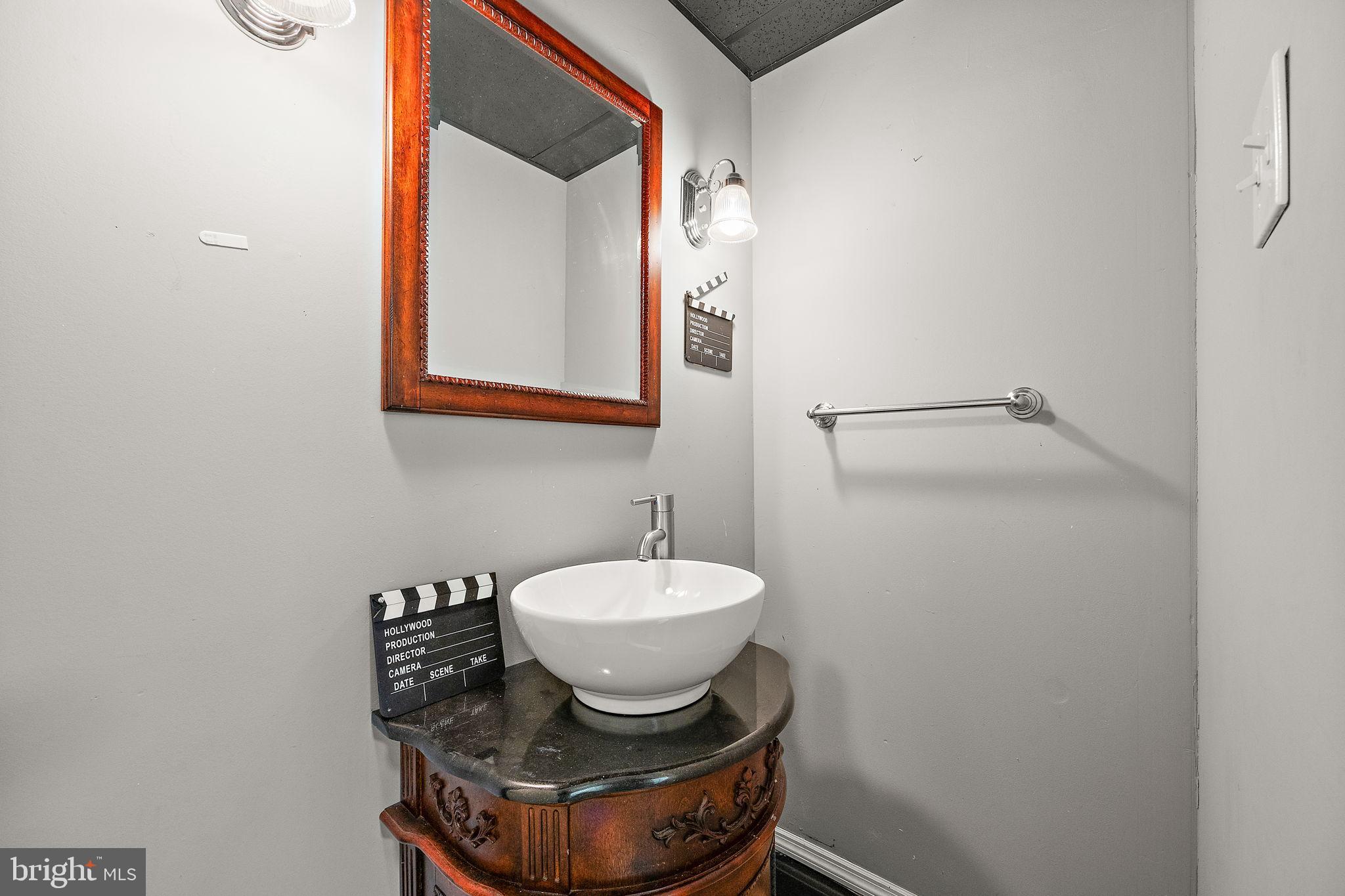 40 Arizona State Drive Newark, DE 19713 - Photo 33 of 50 Chic powder room with vintage flair.