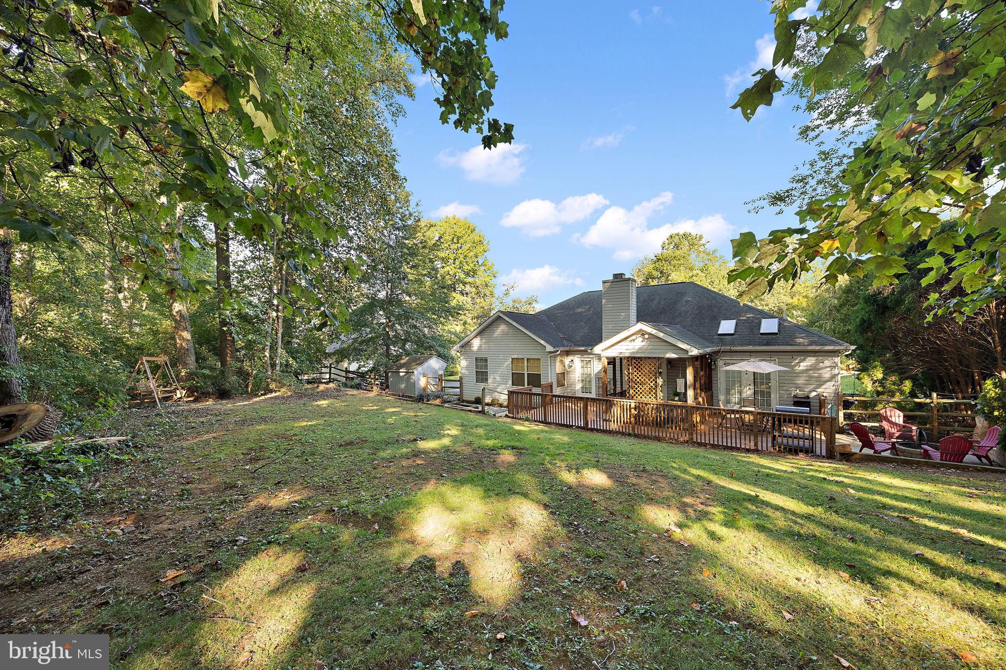 40 Arizona State Drive Newark, DE 19713 - Photo 46 of 50 Serene backyard retreat surrounded by nature.