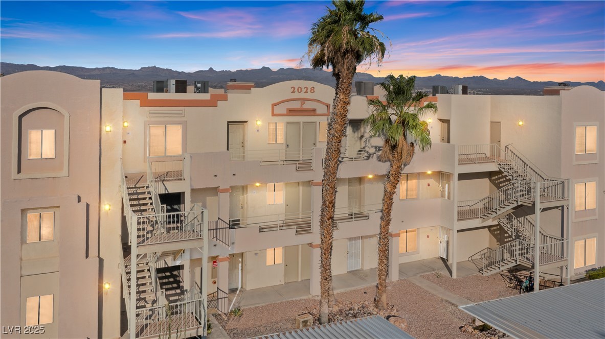 2028 Mesquite Lane, Unit 302 Laughlin, NV 89029 - Photo 2 of 60 View of property featuring a mountain view and stairway