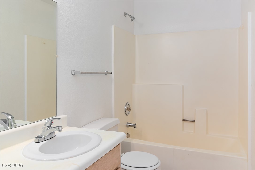 2028 Mesquite Lane, Unit 302 Laughlin, NV 89029 - Photo 21 of 60 Primary Bathroom featuring vanity and shower combination