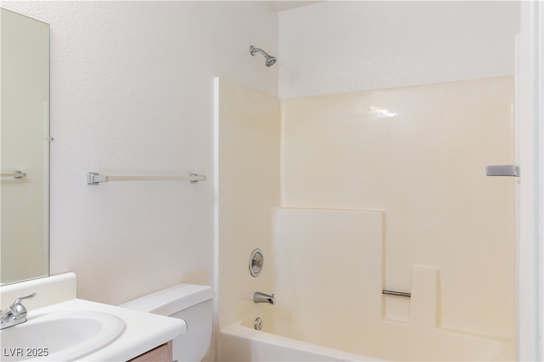 2028 Mesquite Lane, Unit 302 Laughlin, NV 89029 - Photo 26 of 60 Full bath featuring vanity and bathing tub / shower combination