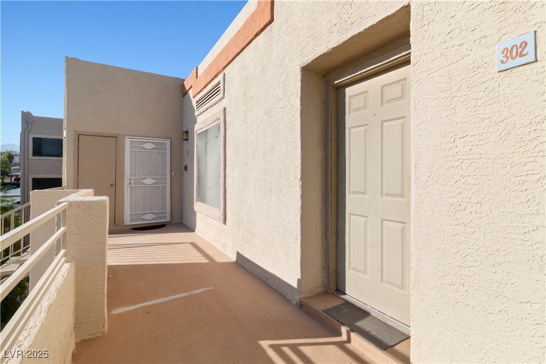 2028 Mesquite Lane, Unit 302 Laughlin, NV 89029 - Photo 3 of 60 Entrance to property featuring stucco siding and a balcony