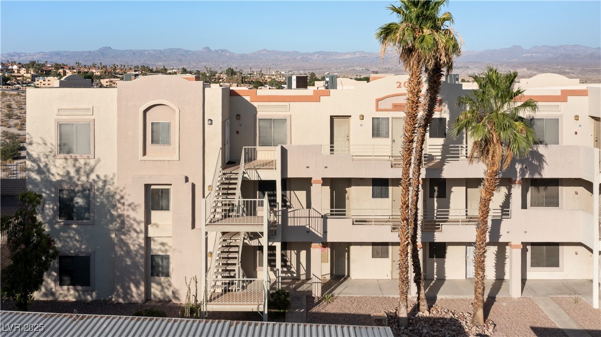 2028 Mesquite Lane, Unit 302 Laughlin, NV 89029 - Photo 31 of 60 View of property featuring stairs, a mountain view, and a residential view