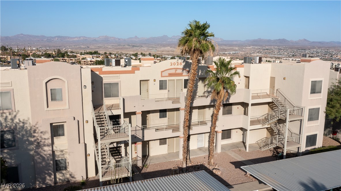 2028 Mesquite Lane, Unit 302 Laughlin, NV 89029 - Photo 33 of 60 View of building exterior featuring a mountain view