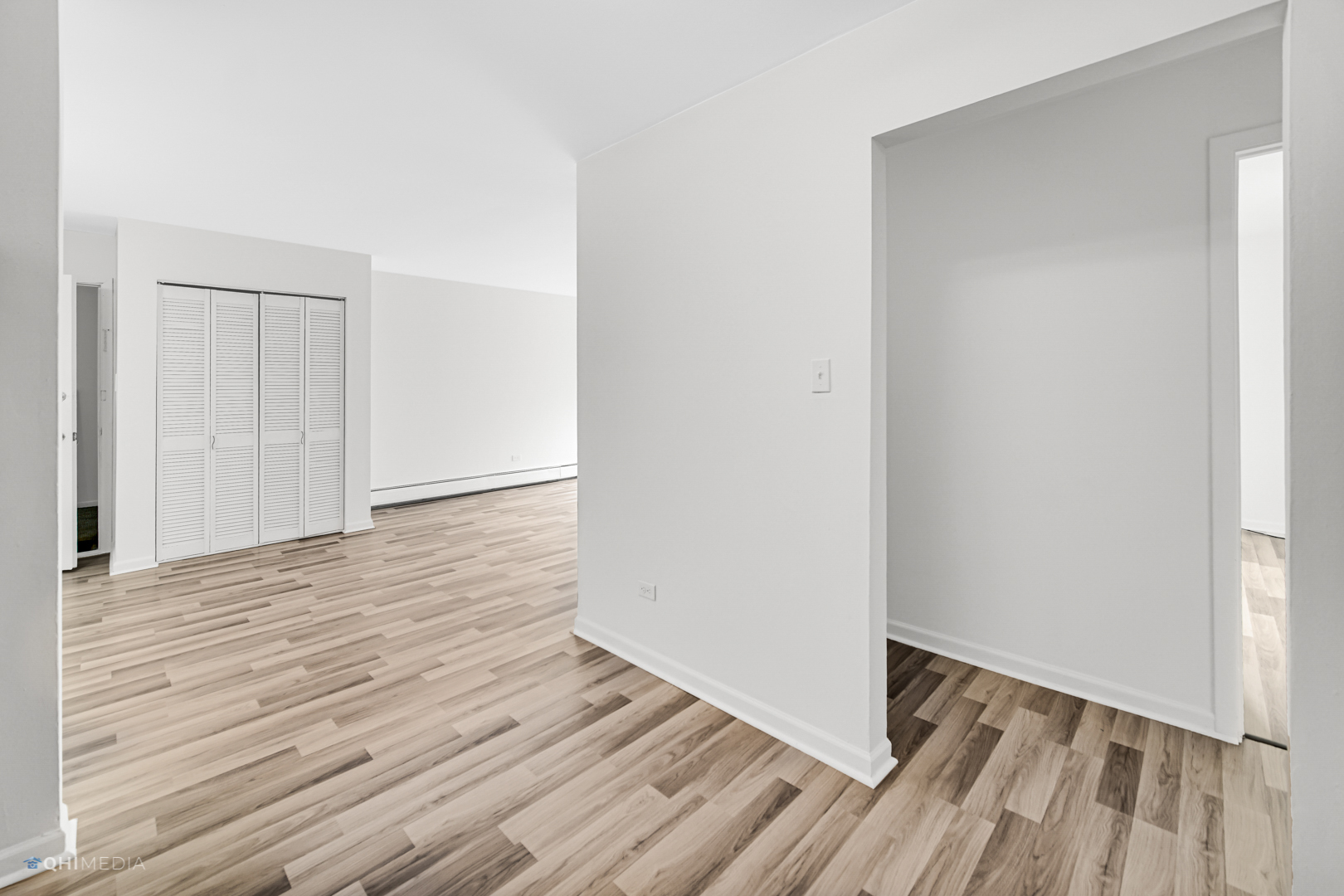 113 West Elk Trail, Unit 313 Carol Stream, IL 60188 - Photo 4 of 12 a view of a room with wooden floor