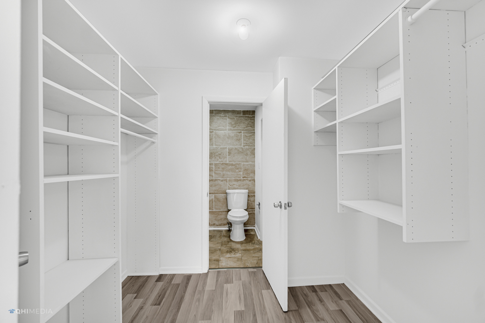 113 West Elk Trail, Unit 313 Carol Stream, IL 60188 - Photo 7 of 12 a view of walk in closet with empty racks