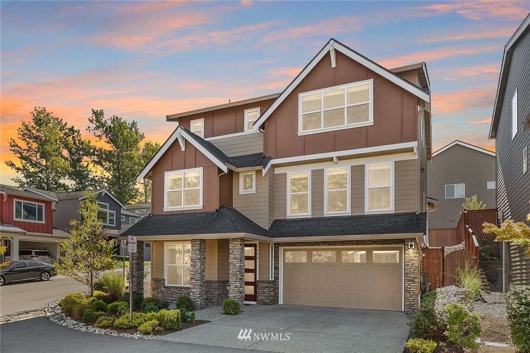 1426 184th Place Southeast Bothell, WA 98012 - Photo 2 of 36 a front view of a house with garden