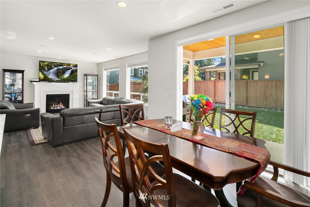 1426 184th Place Southeast Bothell, WA 98012 - Photo 13 of 36 a view of a dining room with furniture window and outside view