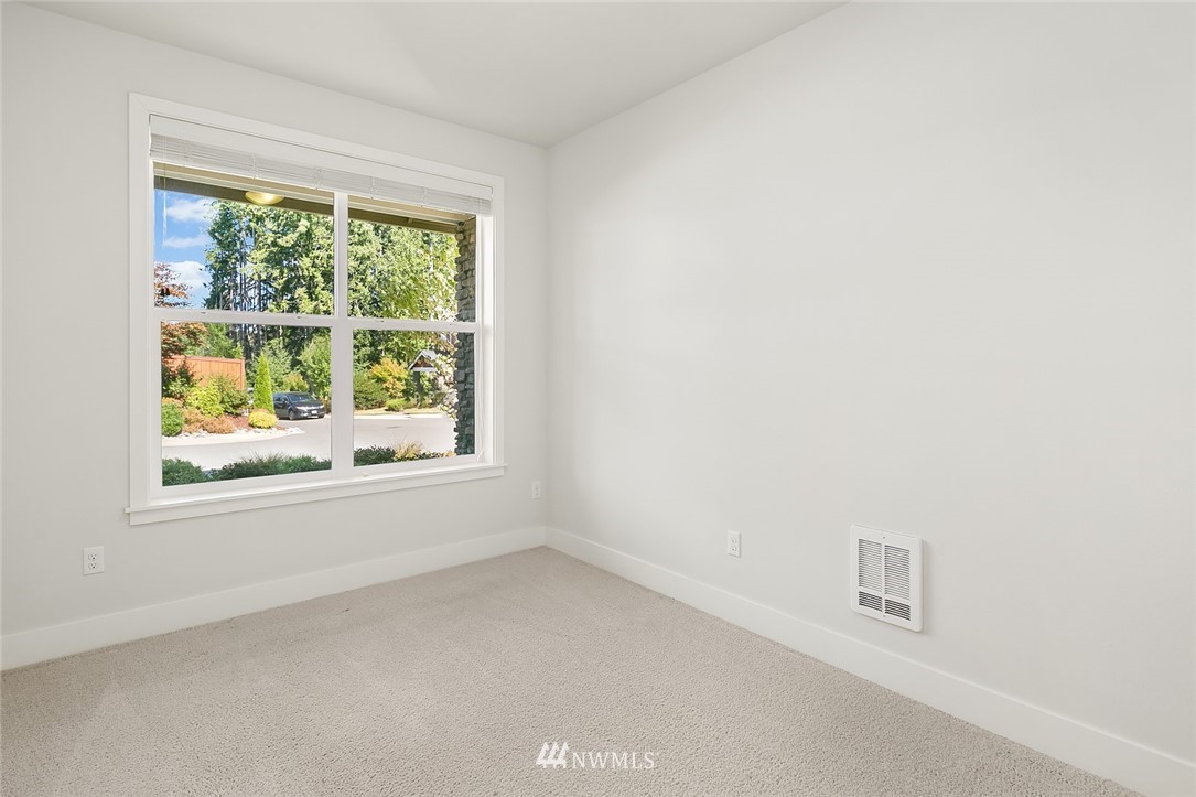 1426 184th Place Southeast Bothell, WA 98012 - Photo 30 of 36 an empty room with a window