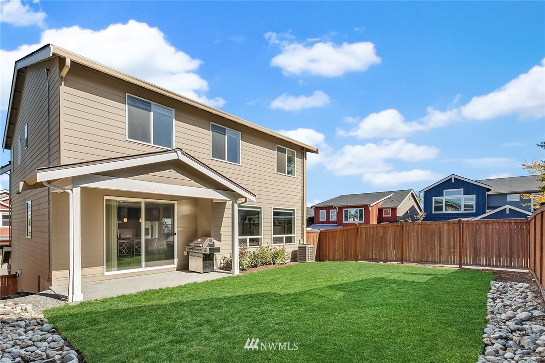 1426 184th Place Southeast Bothell, WA 98012 - Photo 33 of 36 a front view of a house with a yard and porch