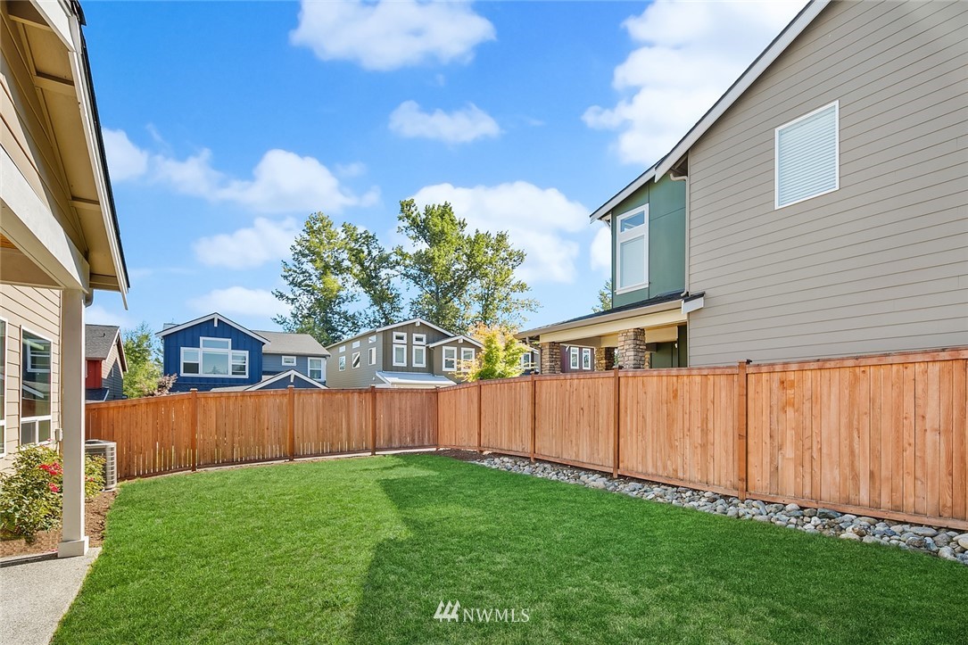 1426 184th Place Southeast Bothell, WA 98012 - Photo 34 of 36 a view of a backyard with wooden fence