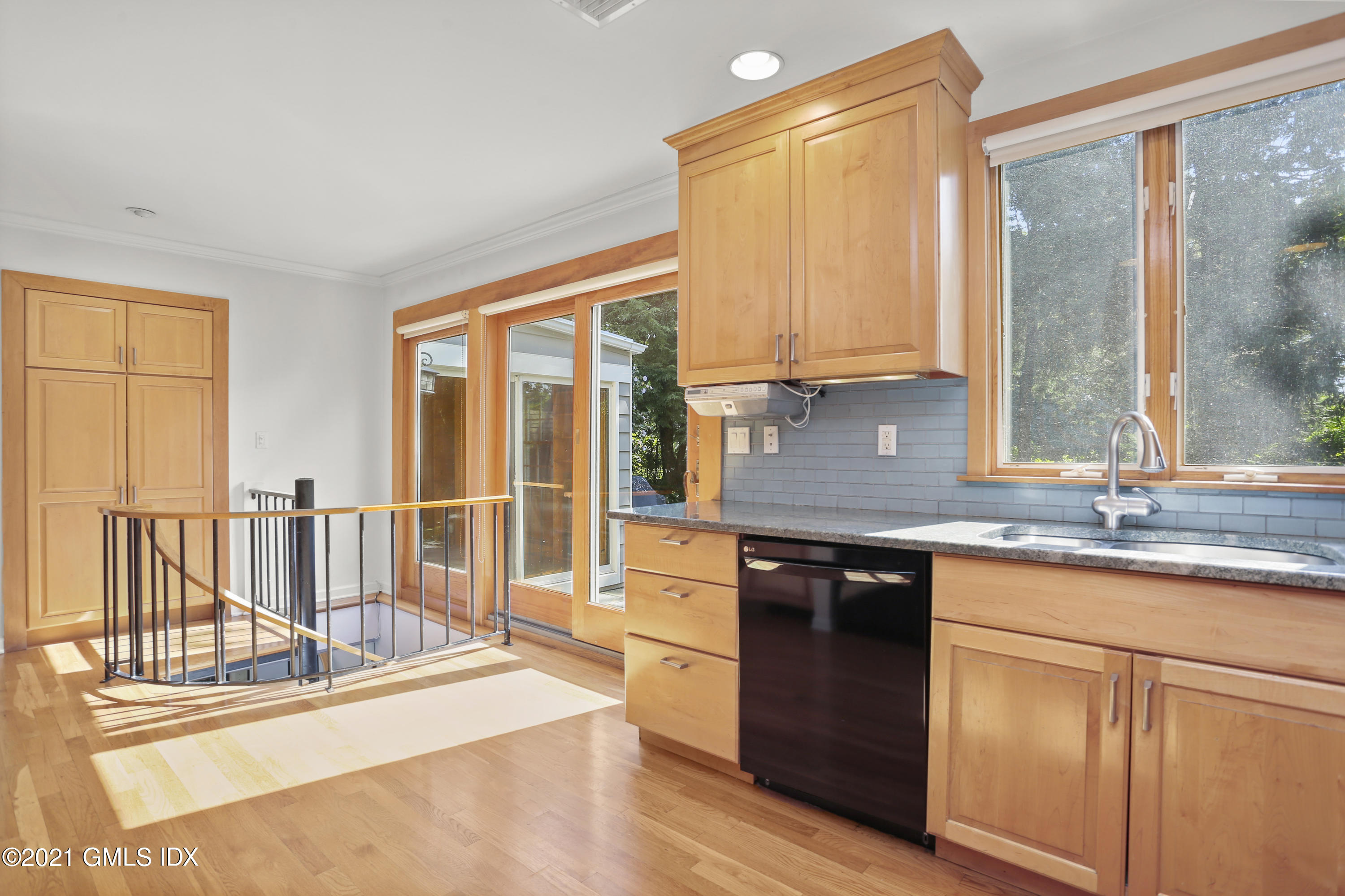 3 Old Wagon Road Old Greenwich, CT 06870 - Photo 13 of 31 a kitchen with stainless steel appliances granite countertop a stove a sink and a microwave
