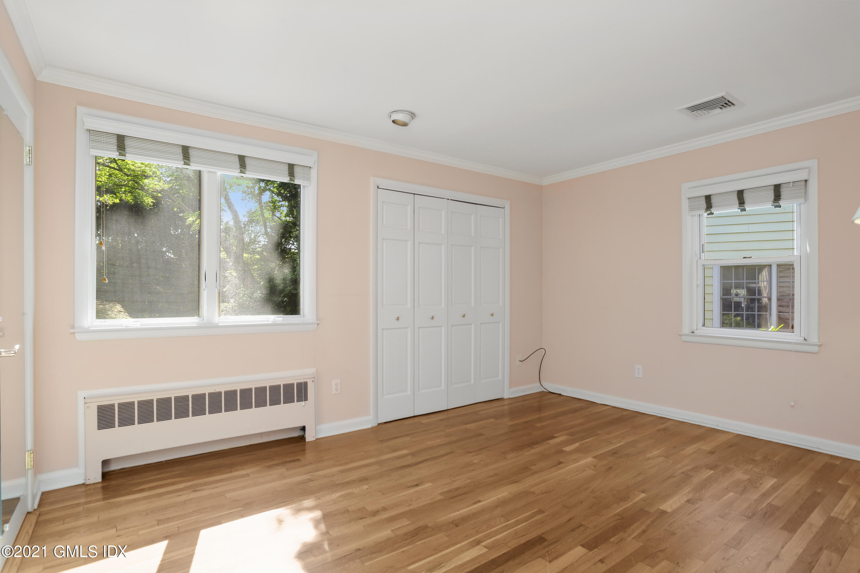 3 Old Wagon Road Old Greenwich, CT 06870 - Photo 15 of 31 a view of an empty room with a window
