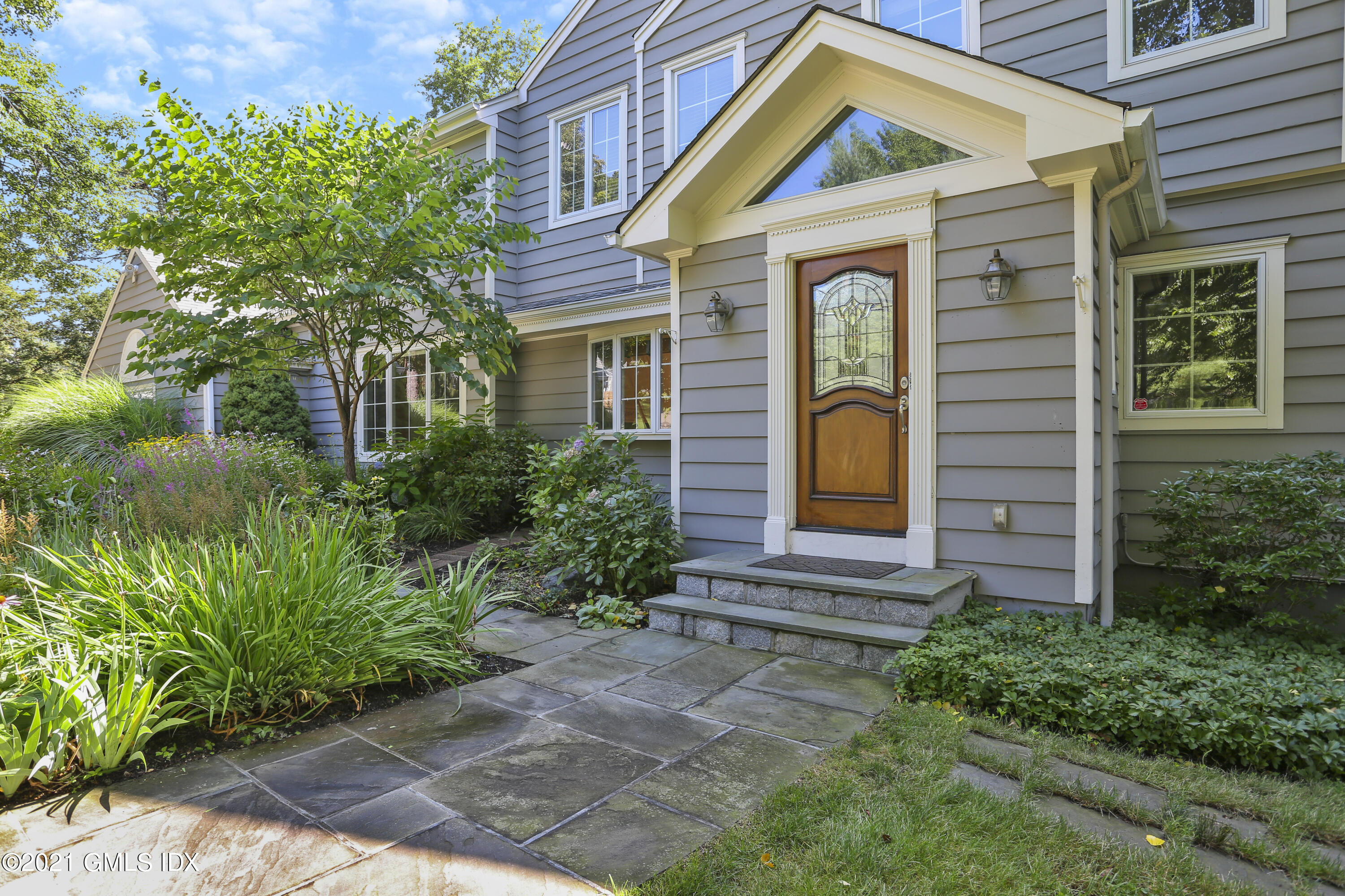 3 Old Wagon Road Old Greenwich, CT 06870 - Photo 2 of 31 a bathroom with a sink and mirror