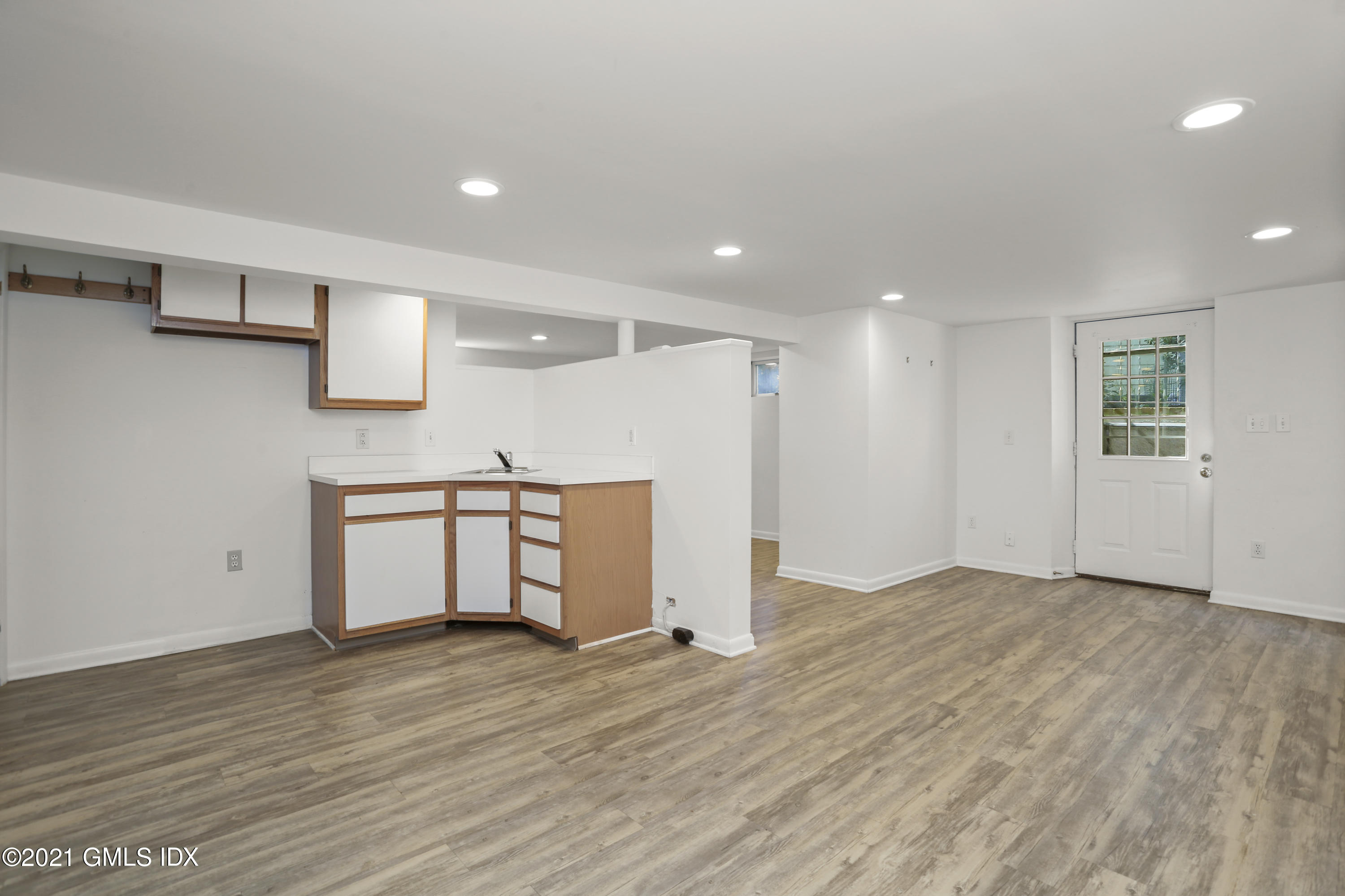 3 Old Wagon Road Old Greenwich, CT 06870 - Photo 23 of 31 a view of a kitchen with a sink and a window