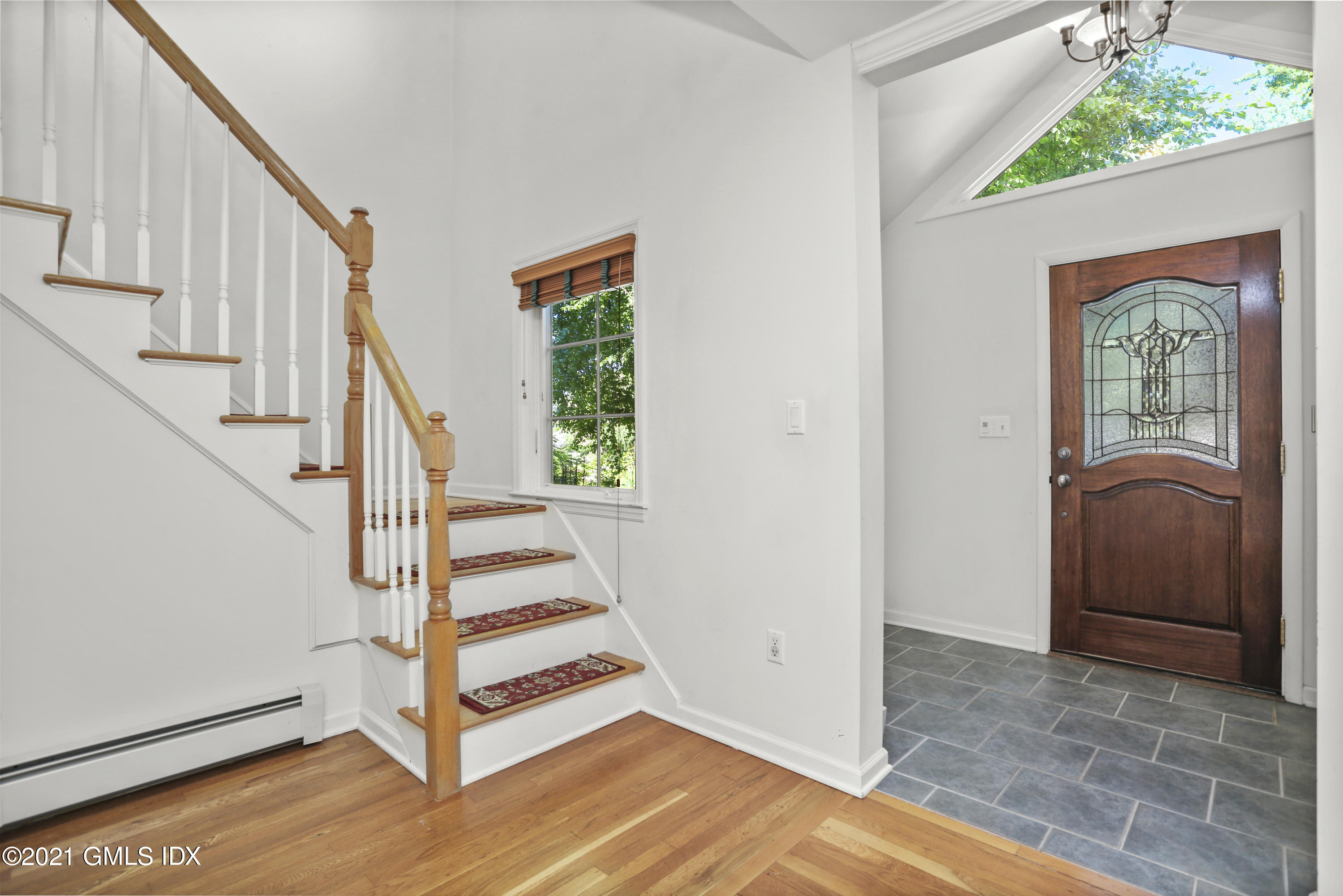 3 Old Wagon Road Old Greenwich, CT 06870 - Photo 3 of 31 a view of an entryway with staircase