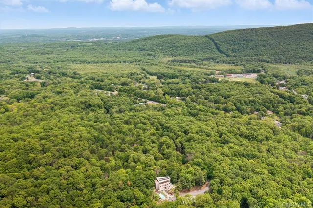 a view of a field with an outdoor space