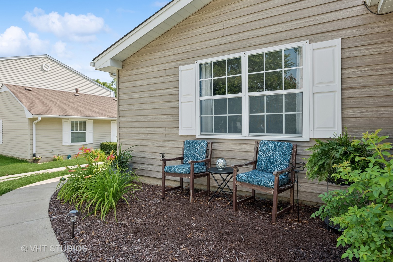 1651 Timber Trail Wheaton, IL 60189 - Photo 3 of 26 a view of a house with backyard and sitting area