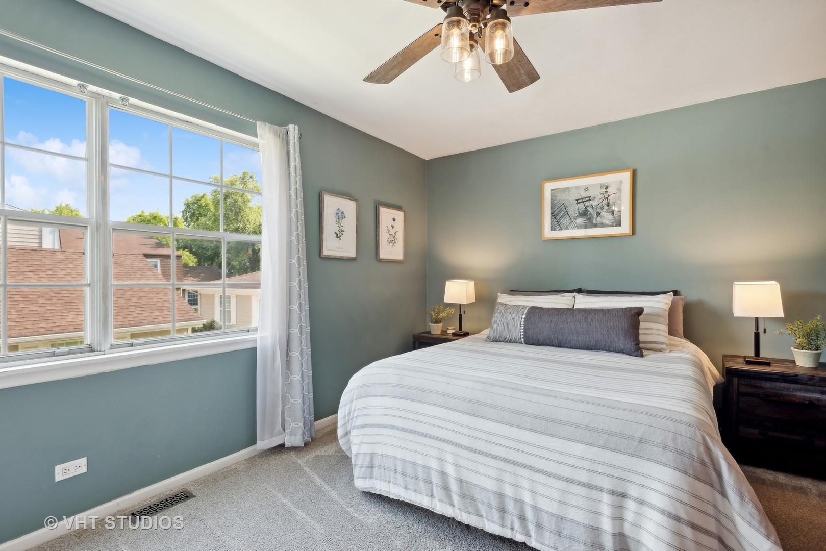1651 Timber Trail Wheaton, IL 60189 - Photo 10 of 26 a bedroom with a large bed and a chandelier