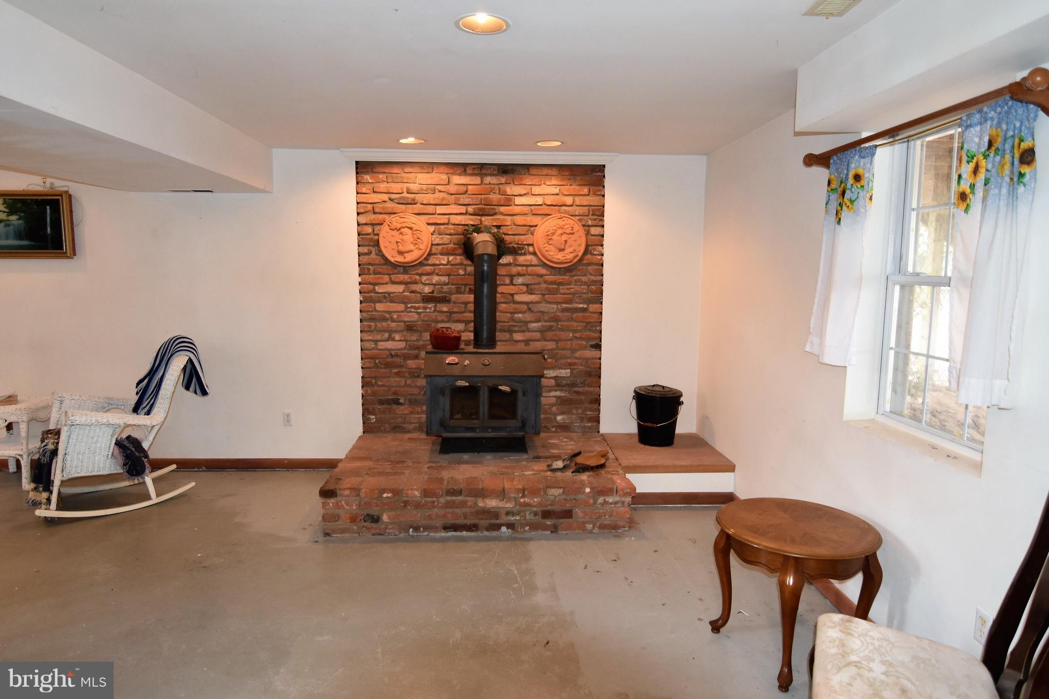 7840 Elizabeth Road Pasadena, MD 21122 - Photo 12 of 25 wood stove