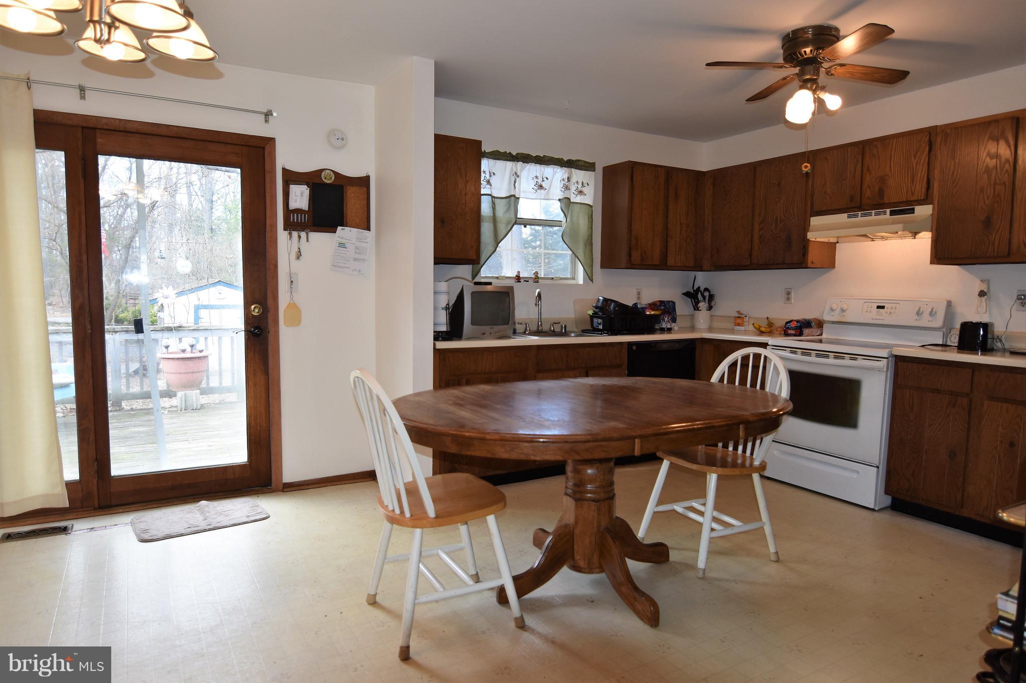 7840 Elizabeth Road Pasadena, MD 21122 - Photo 4 of 25 Kitchen and dining room combine