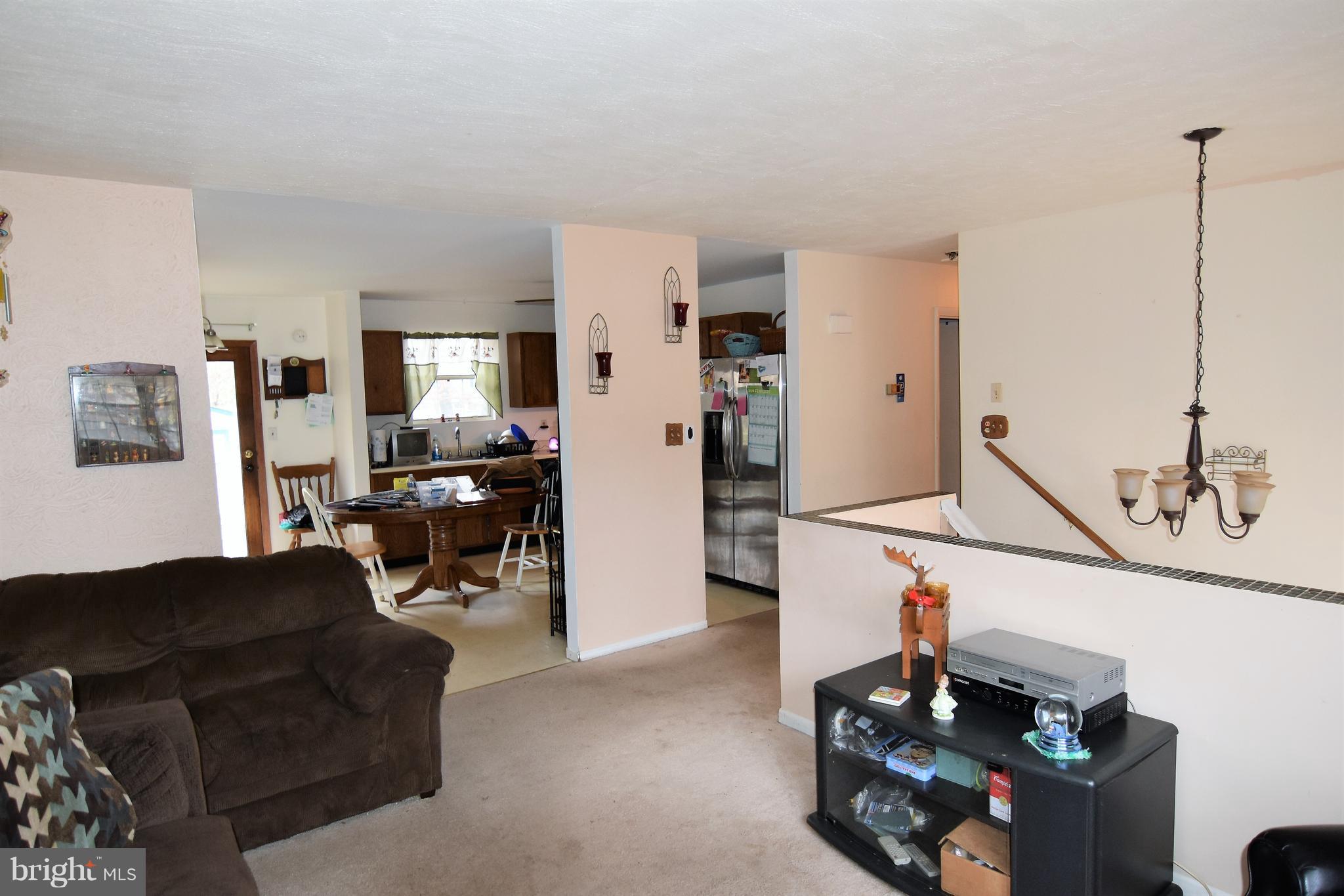 7840 Elizabeth Road Pasadena, MD 21122 - Photo 8 of 25 combine kitchen/dining 12x20