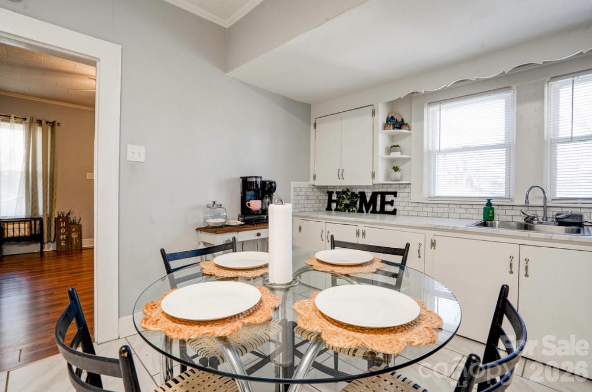 403 Whitener Street Shelby, NC 28152 - Photo 14 of 29 a dining room with table and chairs