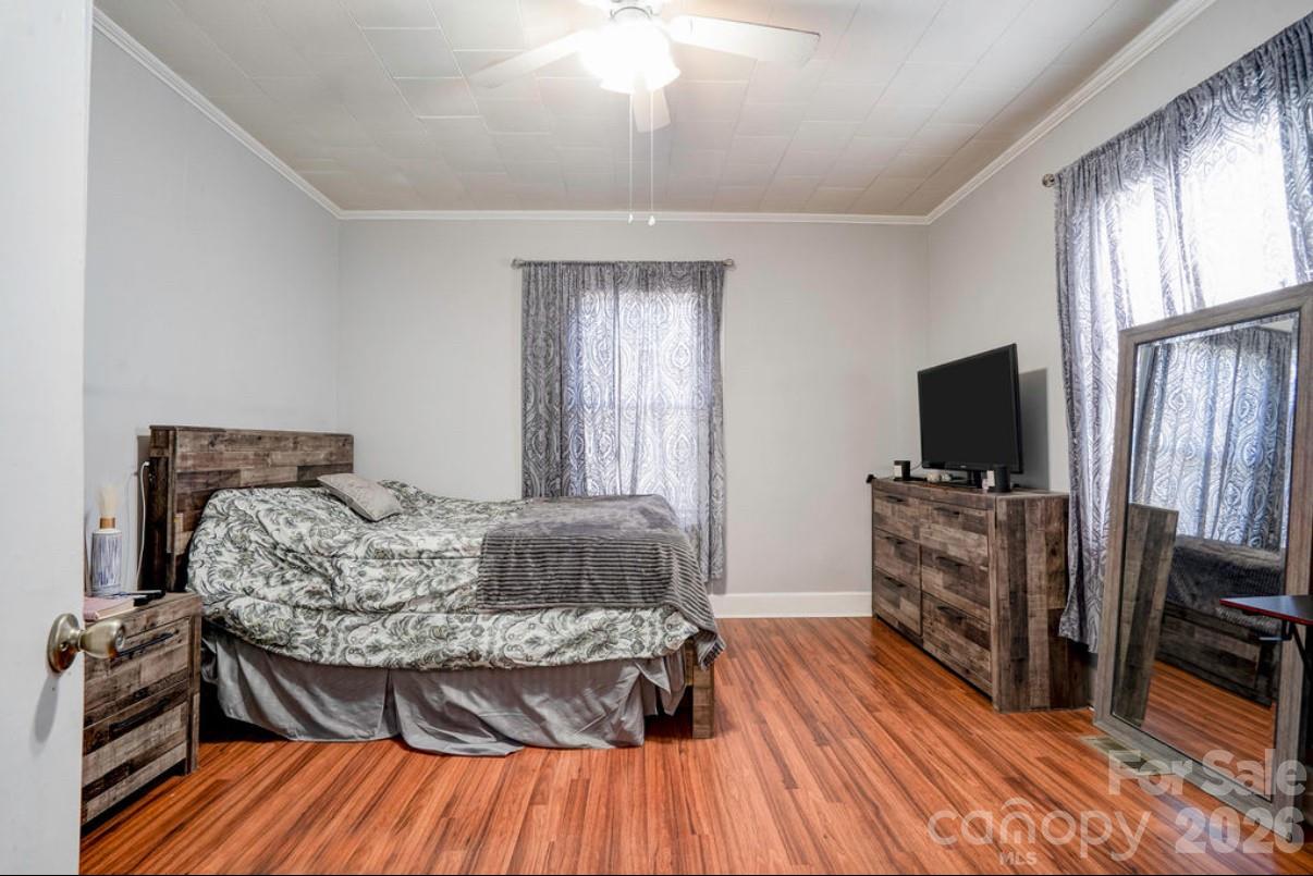 403 Whitener Street Shelby, NC 28152 - Photo 22 of 29 a living room with furniture and a flat screen tv