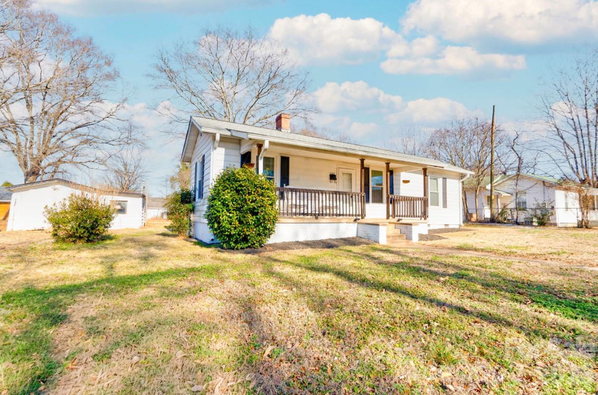 403 Whitener Street Shelby, NC 28152 - Photo 4 of 29 a view of a house with a snow in the yard