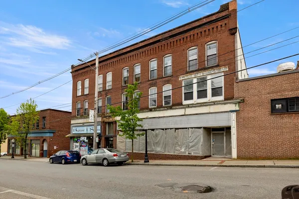 a car parked in front of a building