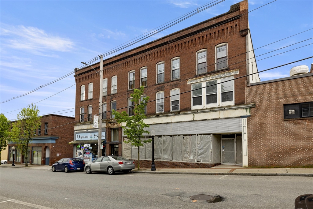 a car parked in front of a building