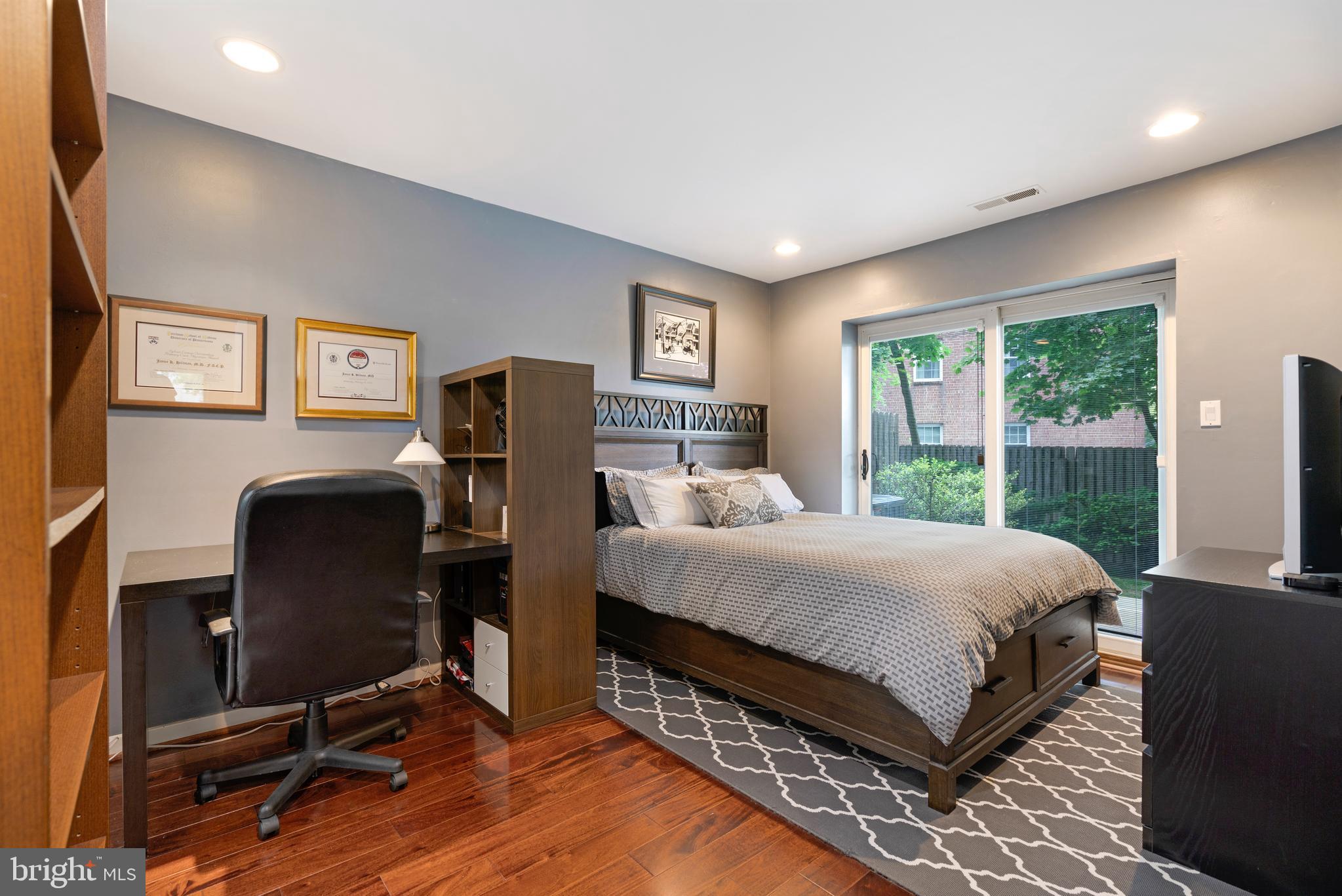 232 Church Road, Unit 3B Ardmore, PA 19003 - Photo 11 of 18 a bedroom with a bed window and a desk