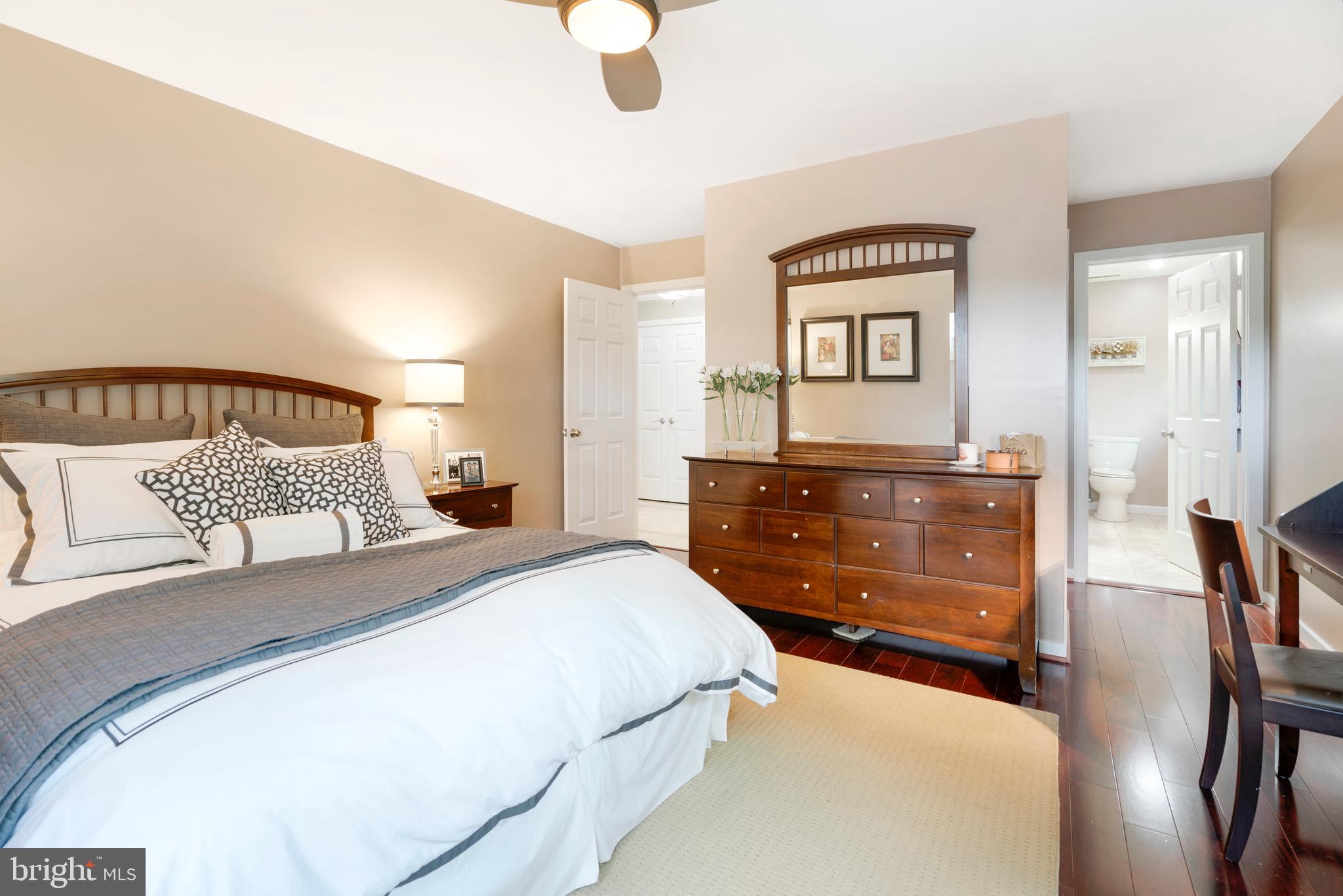 232 Church Road, Unit 3B Ardmore, PA 19003 - Photo 8 of 18 a bedroom with a bed and dresser