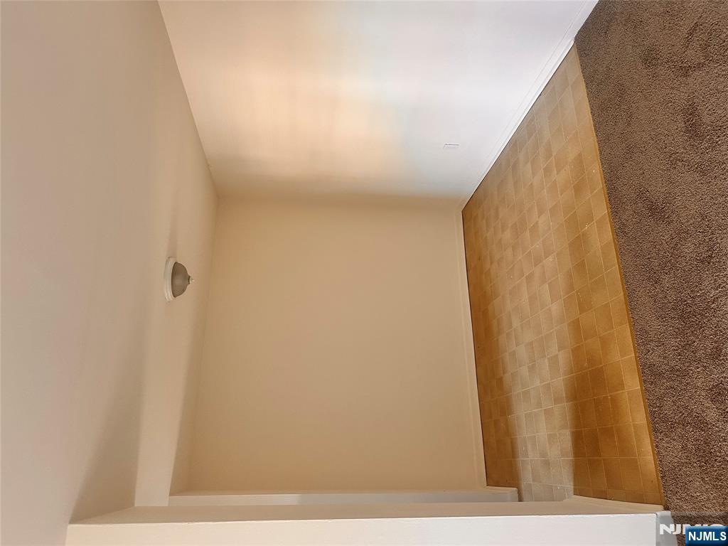 278 Main Street, Unit E3 Little Ferry, NJ 07643 - Photo 3 of 6 a view of an empty room