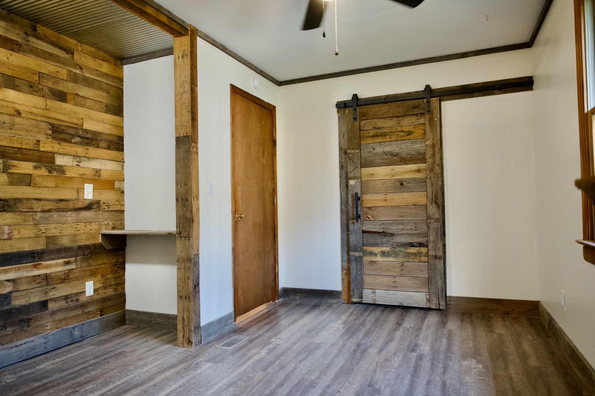 570 Forest Circle Sparta, TN 38583 - Photo 16 of 27 wooden floor in an empty room
