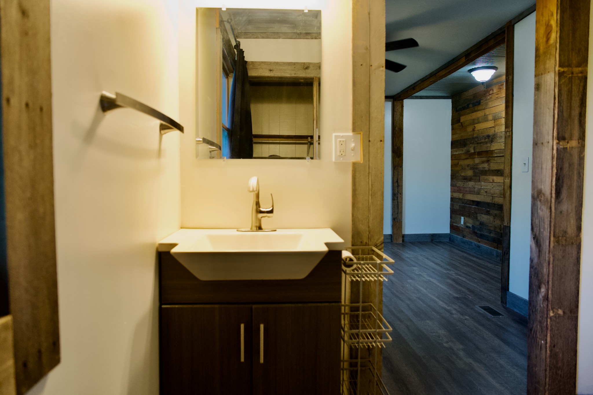 570 Forest Circle Sparta, TN 38583 - Photo 18 of 27 a bathroom with a sink and a mirror