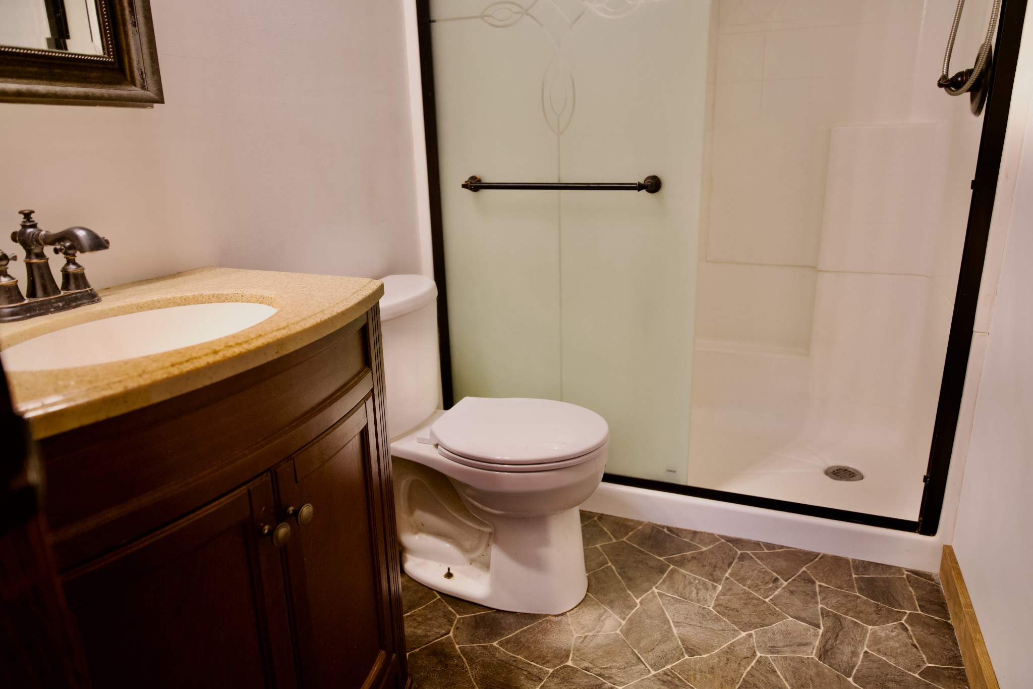 570 Forest Circle Sparta, TN 38583 - Photo 23 of 27 a bathroom with a sink and a toilet