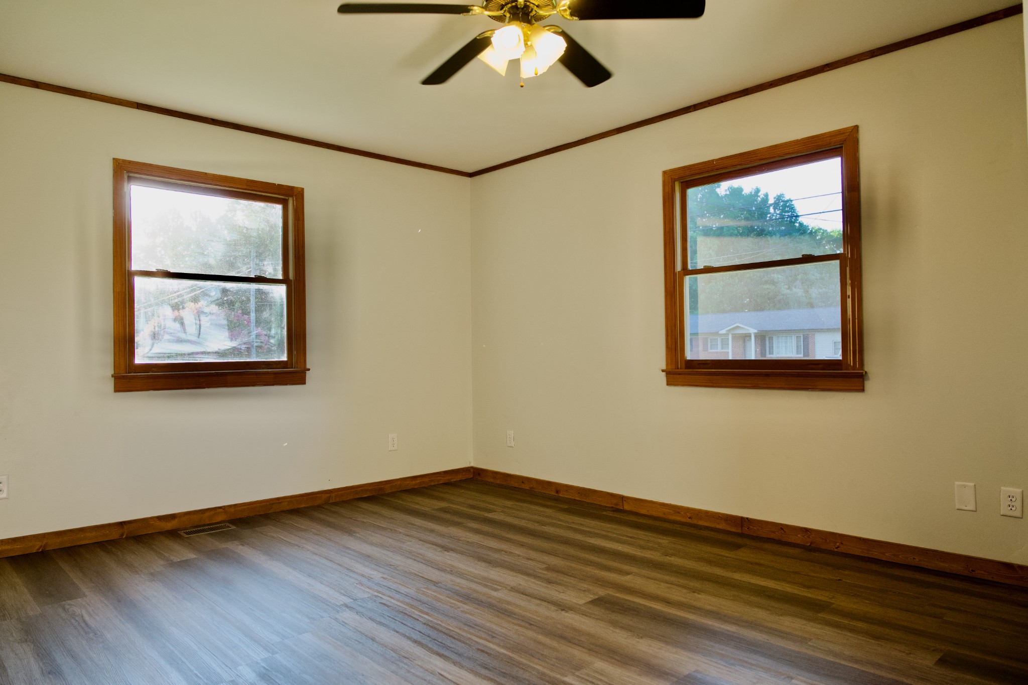 570 Forest Circle Sparta, TN 38583 - Photo 27 of 27 a view of an empty room with wooden floor and a window